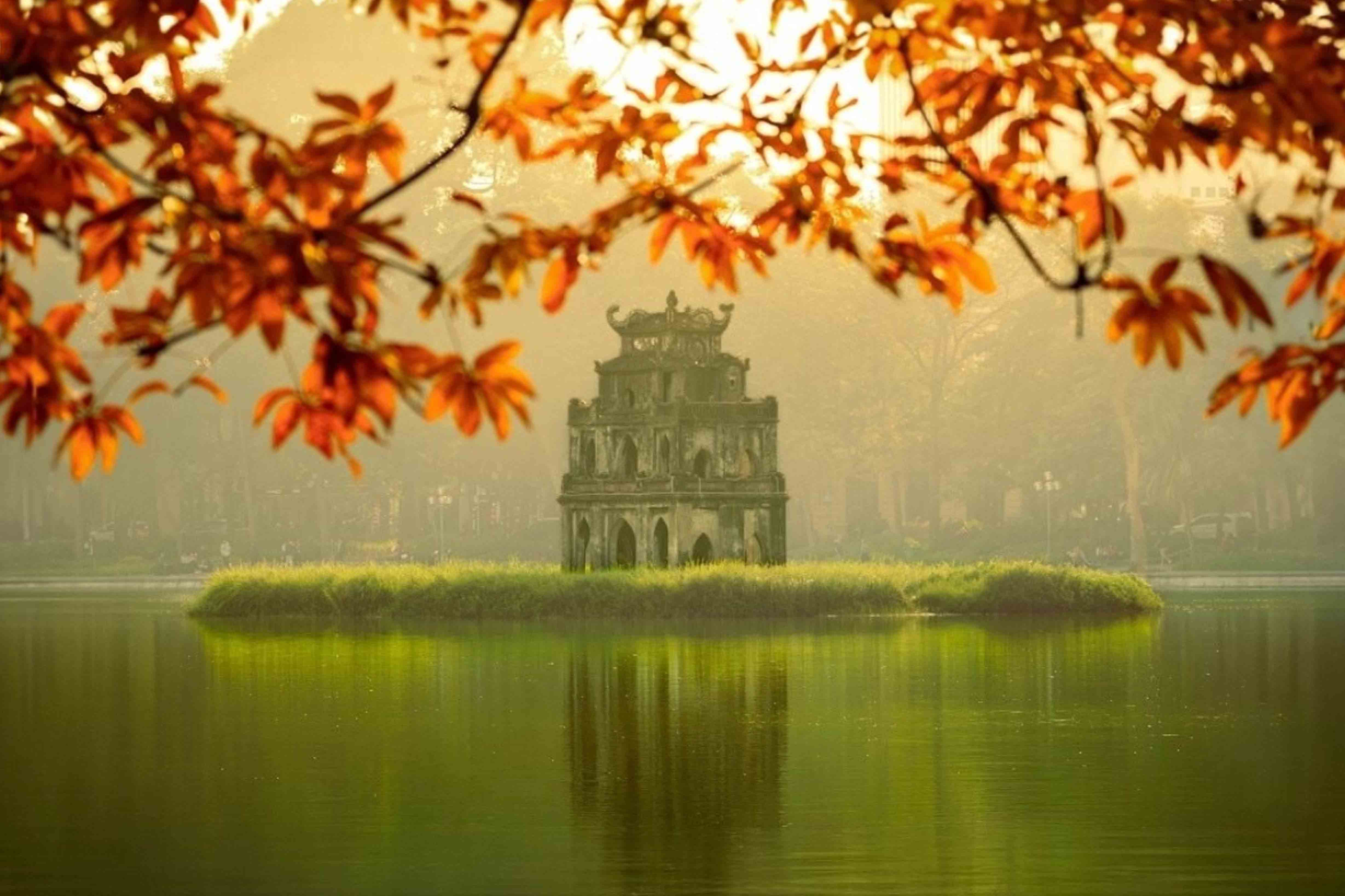 Hanoi Autumn: The Most Beautiful Time to Visit Vietnam's Capital 1 Stroll around Hoan Kiem Lake in hanoi autumn
