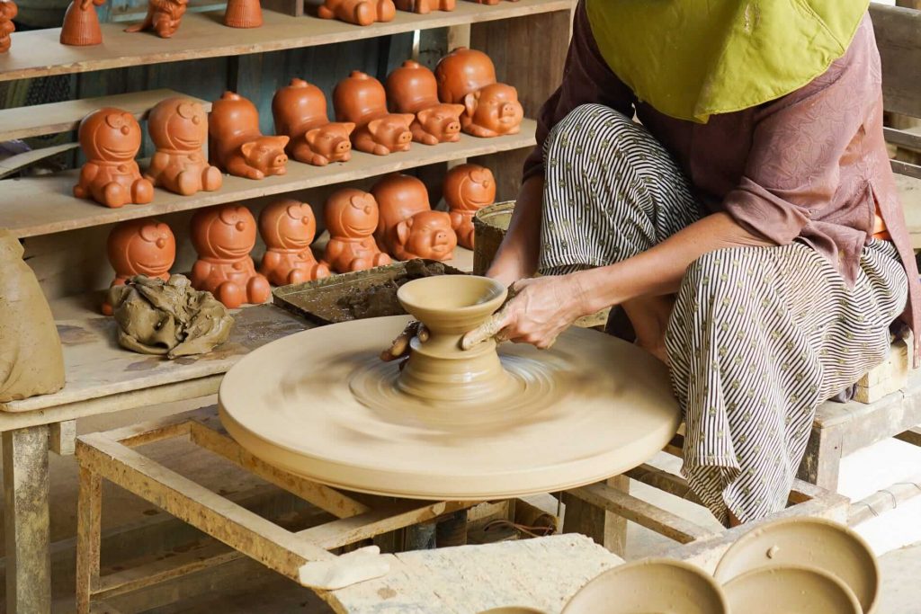 A mixture of hand throwing on a potters wheel and hand building techniques | SJourney