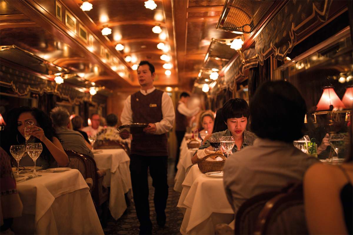 The-Eastern-Oriental-Express-train luxury winter train trips serving dinner