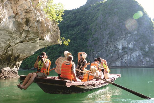 family-cave-exploring-on-boat