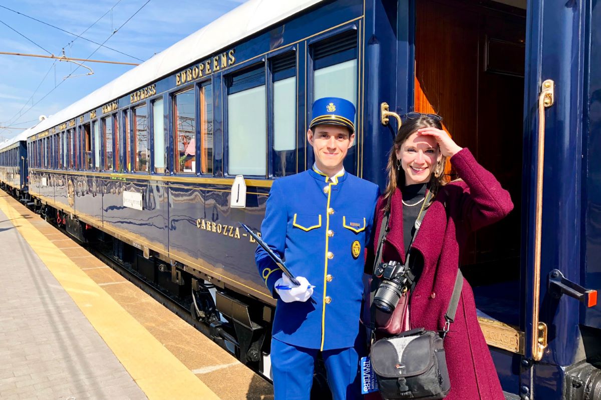 outside-european-luxury-train-staff-and-traveler.