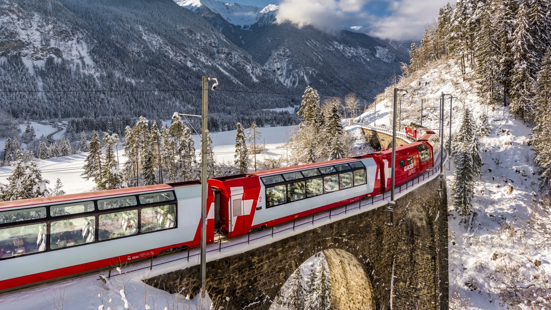  the-glacier-express-train-through-snowy-valley